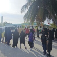 people lining up for a group photo