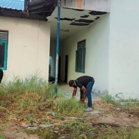 people working on a field