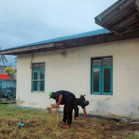 man cleaning a field