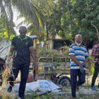 Men standing near a truck